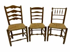 Two 19th century elm ladder back chairs and a 19th century elm spindle back chair