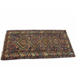 Persian navy blue ground geometric pattern rug