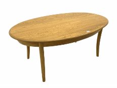 Ercol light elm oval coffee table