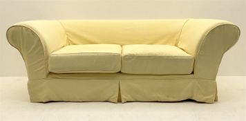 Pair traditional two seat sofas upholstered in pale yellow cover