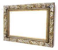 Rectangular wall mirror in leaf moulded frame