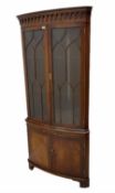 Bevan Funnell 'Reprodux' Georgian style figured mahogany bow front double corner display cabinet