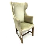 20th century walnut framed high wingback armchair