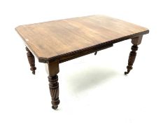 Late Victorian walnut telescopic extending dining table with leaf and winder