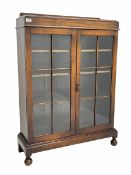 Early 20th century oak glazed bookcase