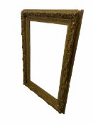 Large ornate 19th century giltwood and gesso mirror/frame