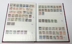 Mostly Japanese stamps in one stockbook