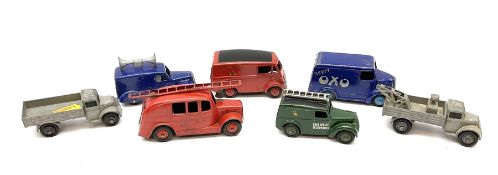 Dinky - seven unboxed and playworn early commercial vehicles comprising Streamlined Fire Engine