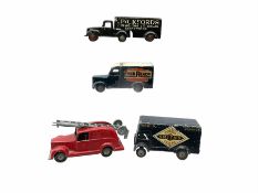 Timpo Toys - four unboxed and playworn die-cast commercial vehicles comprising Smiths Crisps van; Pi