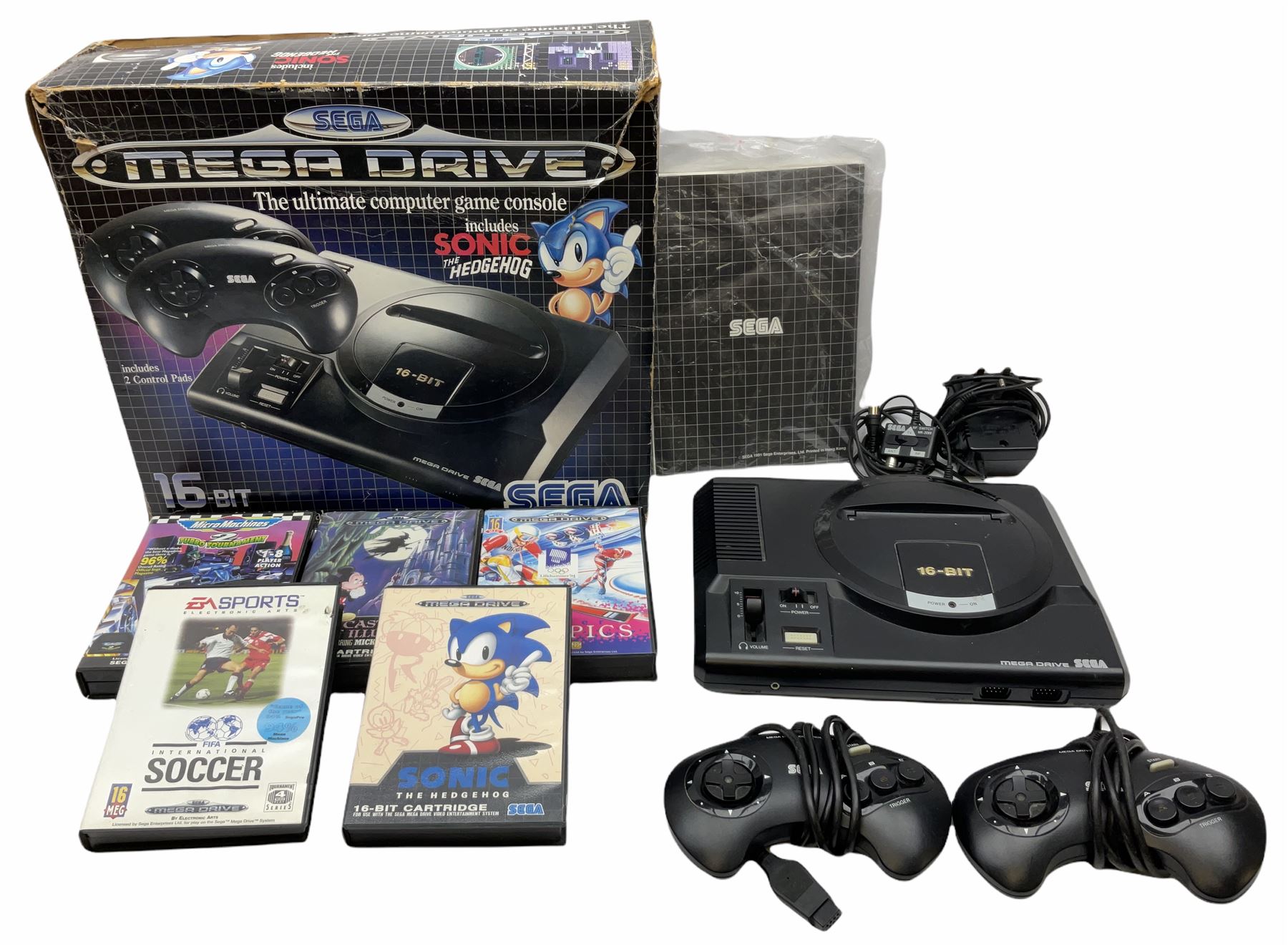 1990s Sega Megadrive 16bit games console with five games comprising Sonic the Hedgehog