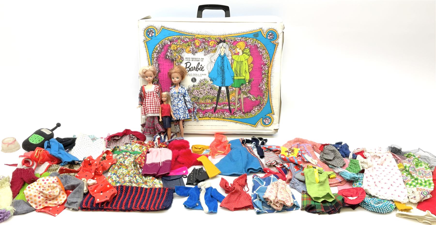 The World of Barbie Double Doll Case containing a quantity of assorted doll's clothing; together wit