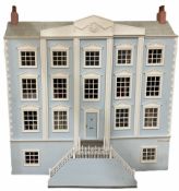 Large and impressive Georgian style wooden double fronted four-storey dolls house with pale blue stu
