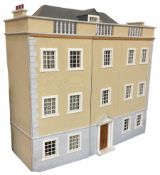 Georgian style wooden double fronted three-storey dolls house with textured rendering finish to the
