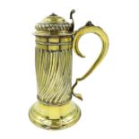 Georgian silver-gilt wine flagon with spiral ribbed body scroll handle and hinged cover