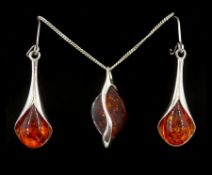 Pair of silver amber pendant earrings and a silver amber pendant necklace