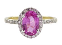 18ct gold oval pink sapphire and diamond halo cluster ring