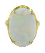 Gold single stone oval opal ring