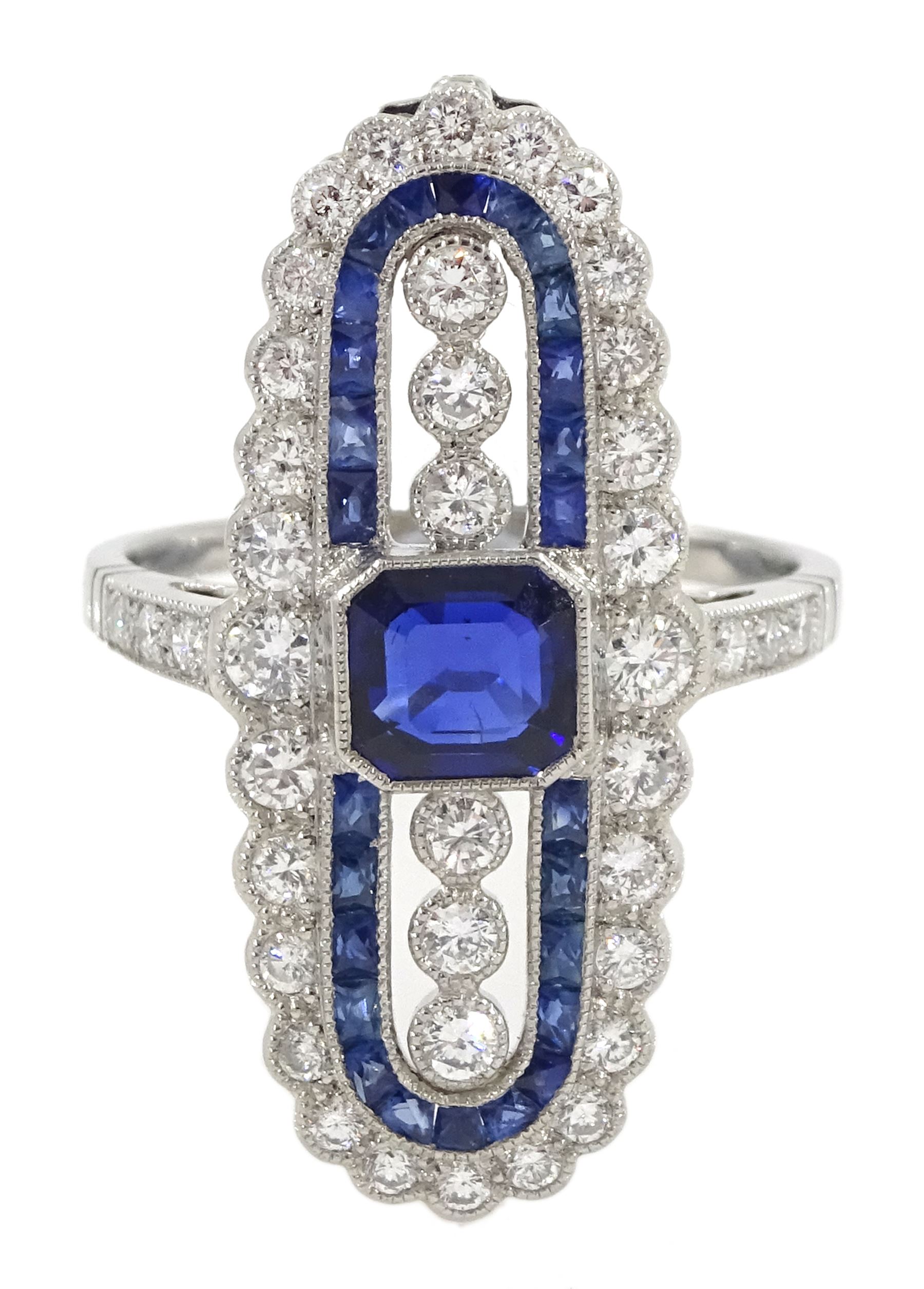 Platinum sapphire and diamond oval panel ring