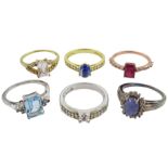 Six silver and silver-gilt stone set rings including ruby and topaz