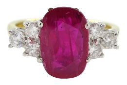 18ct gold oval ruby and round brilliant cut diamond ring