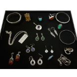 Silver and stone set silver jewellery including amber rings and pair of earrings