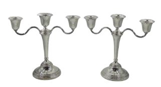 Pair of silver three branch candelabra by Elkington & Co Ltd