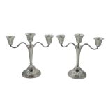 Pair of silver three branch candelabra by Elkington & Co Ltd