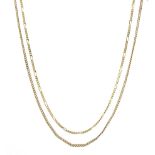 Gold Figaro link necklace and a gold curb chain necklace