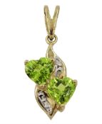 9ct gold heart shaped peridot and diamond pendant