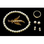 Two pairs of gold pearl stud earrings