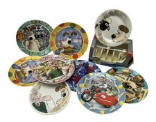 Eight Wallace and Gromit collectors plates