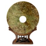 Large Chinese green and russet jade Bi-Disc