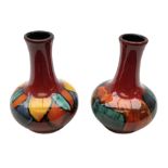 Two Poole pottery baluster vases