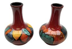 Two Poole pottery baluster vases