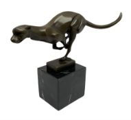 Stylised bronze figure of a running cheetah