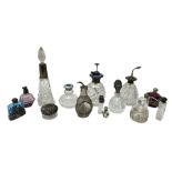 Silver collared and lidded glass perfume bottles and atomisers