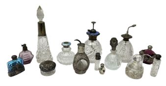 Silver collared and lidded glass perfume bottles and atomisers