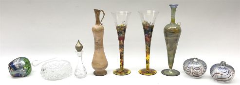 Two iridescent art glass vases of compressed form