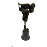 Art Deco style bronze figure modelled as a dancer with a three headed snake at her feet