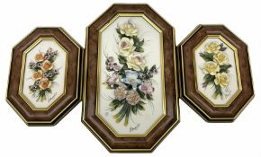 Set of three capo-de-monte wall plaques