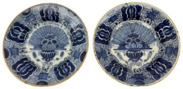 Pair of 18th/19th century Dutch Delft blue and white peacock plates