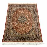 Persian Keshan red and blue ground rug