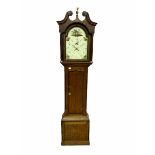 A 19th century oak and mahogany longcase with a swan�s neck pediment and dentil moulding