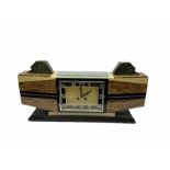 1930�s French Art Deco mantle clock in distinctive vein cut brown marble with inlaid cream and black