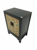 Oriental ebonised and painted two door cabinet
