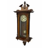 Eight-day early 20th century rack striking German spring driven Vienna wall clock striking on a coil