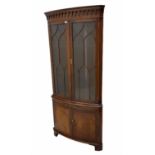 Bevan Funnell 'Reprodux' Georgian style figured mahogany bow front double corner display cabinet