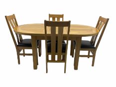 Solid oak oval extending dining table