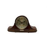 1930�s English oak cased eight-day striking mantle clock striking the hours on a coiled gong