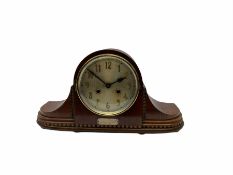 1930�s English oak cased eight-day striking mantle clock striking the hours on a coiled gong